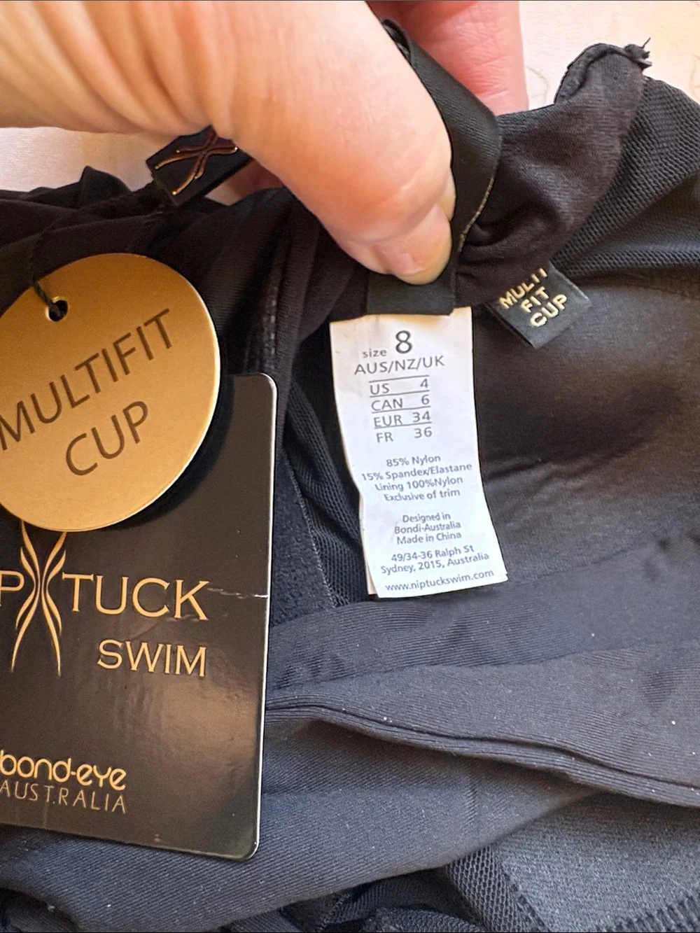 bond-eye Black Ruched One-Piece with Twisted Halter
